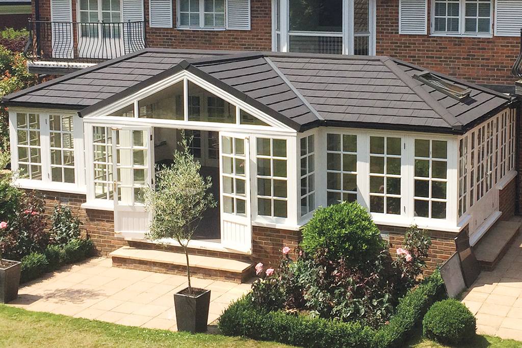 Infil Blog Header – Warm Roofs warm conservatory roof with glazed doors and windows