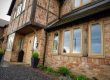 front of a cottage or house that has Double Glazing windows and doors
