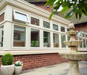 Conservatory-and-fountain-in-garden-1500x750